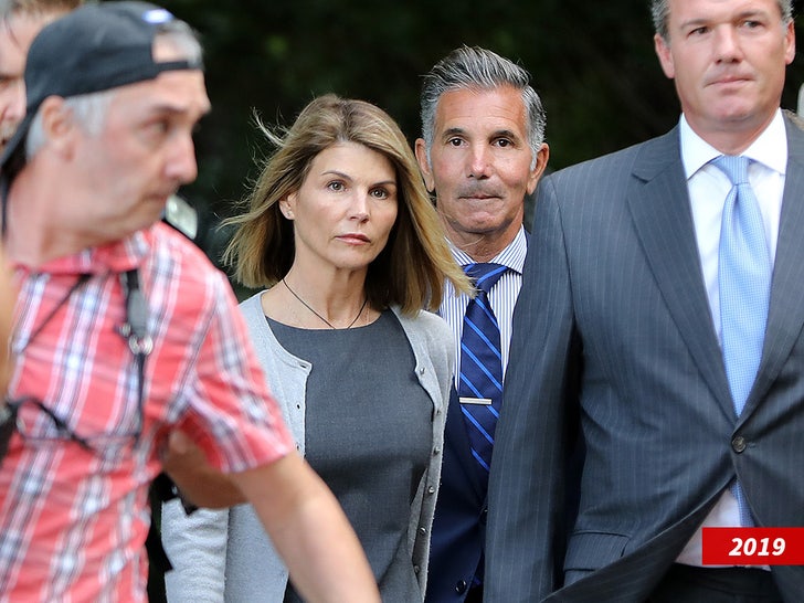 Lori Loughlin and Mossimo Giannulli sub getty swipe 4