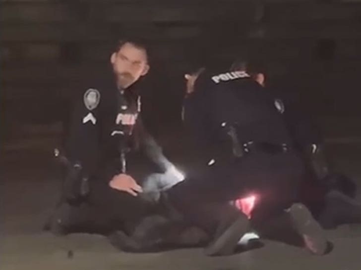 110525_greensboro_police_brutality_face